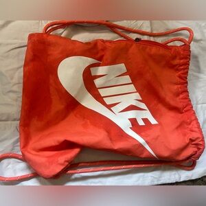 Used Nike drawstring backpack
Pink color
